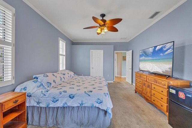 5106 Far Oak Cir, Sarasota, FL 34238 - bedroom featuring visible vents, ornamental molding, baseboards, and light carpet