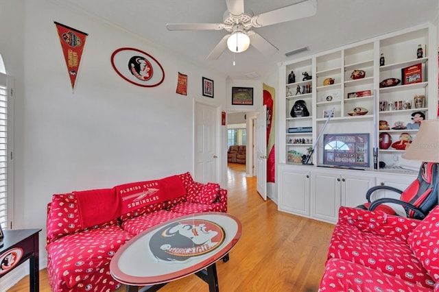 5106 Far Oak Cir, Sarasota, FL 34238 - living room with visible vents, a ceiling fan, and light wood-type flooring