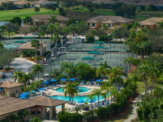aerial perspective of suburban area with a pool