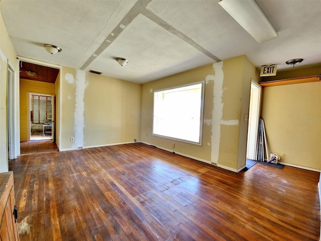 4221 26th St W, Bradenton, FL 34205 - spare room with visible vents, baseboards, and wood-type flooring