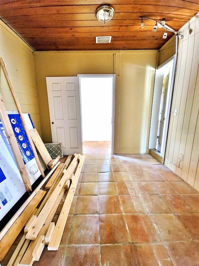 4221 26th St W, Bradenton, FL 34205 - interior space featuring wood ceiling, wooden walls, and visible vents