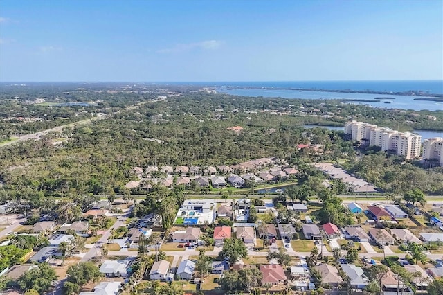 aerial view with a water view and a residential view