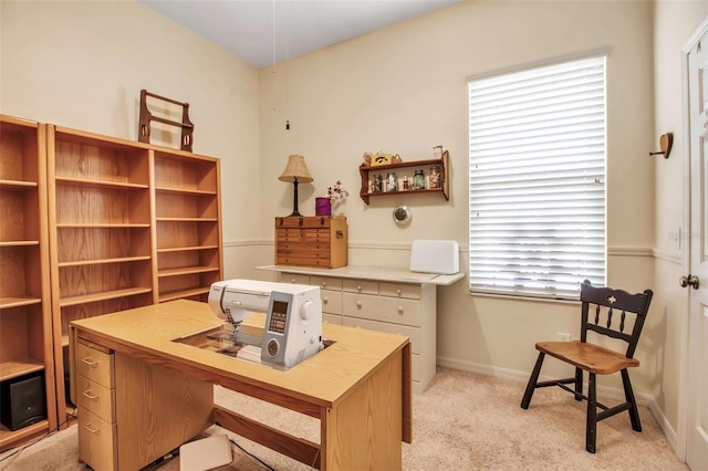 home office with light carpet and baseboards