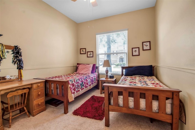 bedroom featuring ceiling fan and light carpet