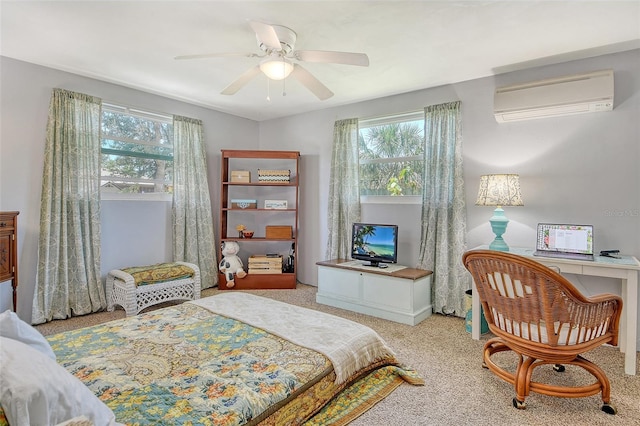 bedroom with ceiling fan, multiple windows, carpet flooring, and a wall mounted air conditioner