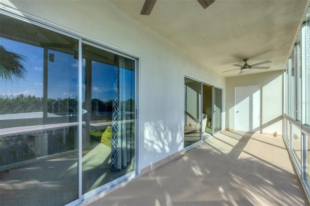 balcony featuring ceiling fan