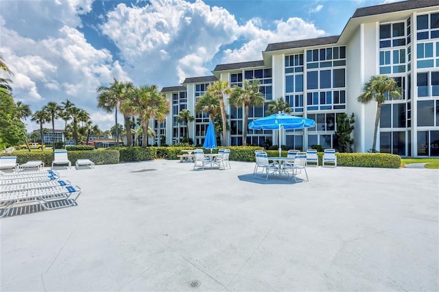 view of community with a patio