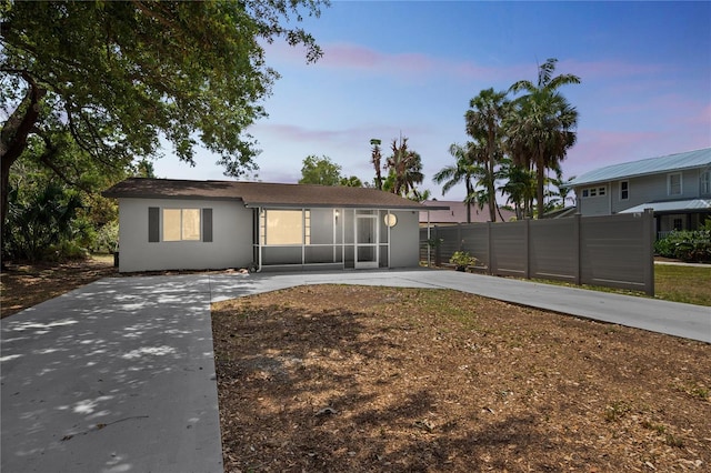 1722 Linhart Ave, Fort Myers, FL 33901 - view of front facade featuring stucco siding and driveway
