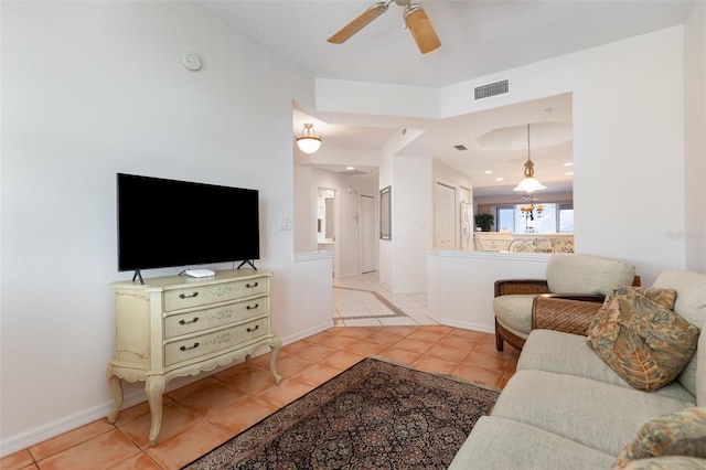 242 Hidden Bay Dr Unit 603, Osprey, FL 34229 - living area with light tile patterned flooring and ceiling fan