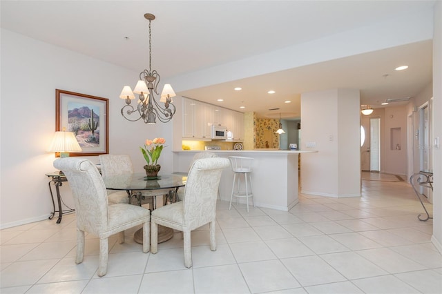 242 Hidden Bay Dr Unit 603, Osprey, FL 34229 - dining room featuring recessed lighting, a chandelier, and light tile patterned floors