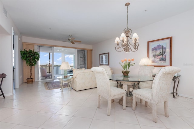 242 Hidden Bay Dr Unit 603, Osprey, FL 34229 - dining area with a chandelier, ceiling fan, and light tile patterned floors