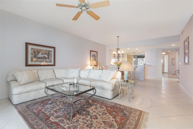 242 Hidden Bay Dr Unit 603, Osprey, FL 34229 - living room with light tile patterned flooring, a chandelier, and ceiling fan