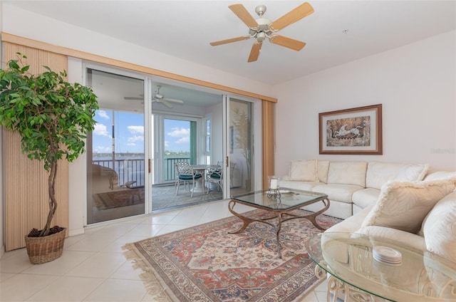 242 Hidden Bay Dr Unit 603, Osprey, FL 34229 - living area with a ceiling fan and light tile patterned floors
