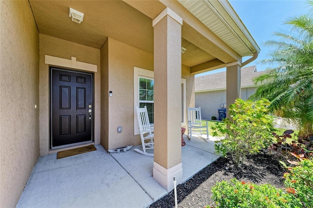 7822 110th Ave E, Parrish, FL 34219 - view of exterior entry with stucco siding
