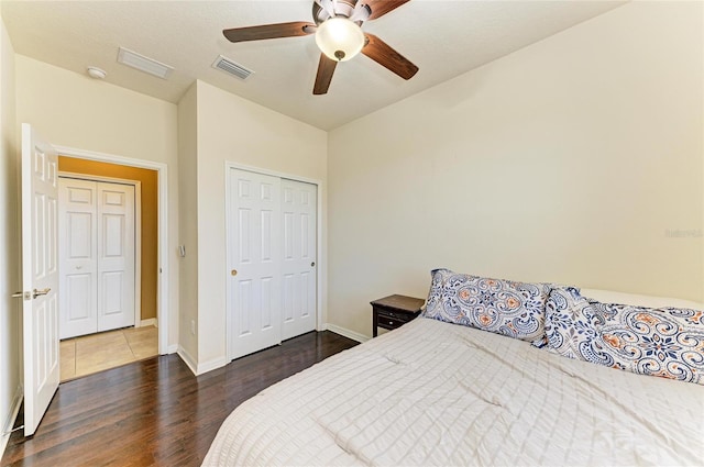 7822 110th Ave E, Parrish, FL 34219 - bedroom featuring wood finished floors, visible vents, baseboards, and a closet