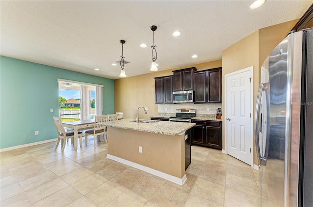 7822 110th Ave E, Parrish, FL 34219 - kitchen featuring appliances with stainless steel finishes, backsplash, recessed lighting, and a sink