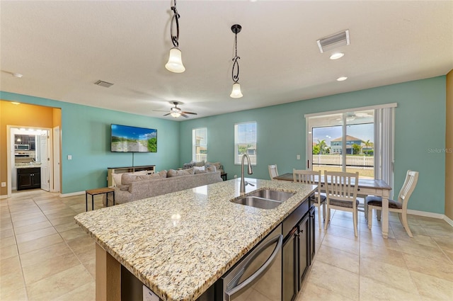 7822 110th Ave E, Parrish, FL 34219 - kitchen with visible vents, decorative light fixtures, dishwasher, and a sink