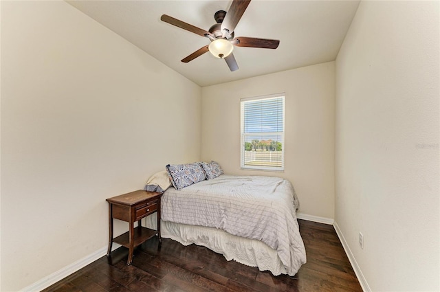7822 110th Ave E, Parrish, FL 34219 - bedroom featuring dark wood-style flooring, ceiling fan, and baseboards