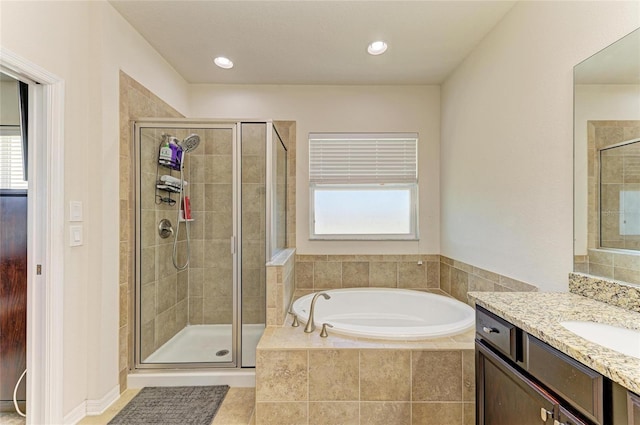 7822 110th Ave E, Parrish, FL 34219 - bathroom featuring a stall shower, a wealth of natural light, and a bath