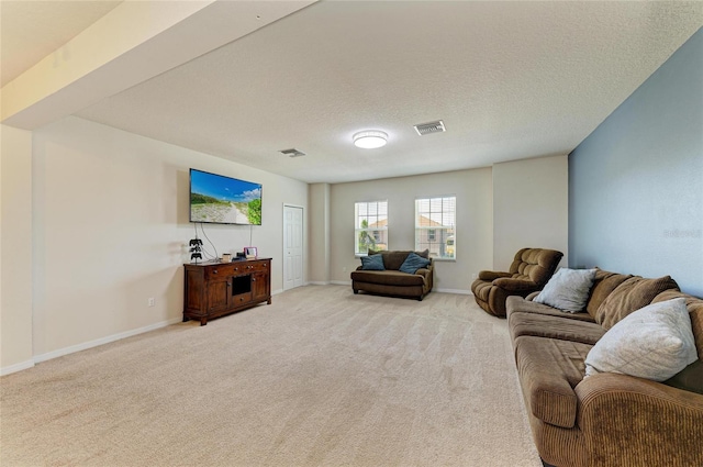 7822 110th Ave E, Parrish, FL 34219 - living room featuring visible vents, light colored carpet, and baseboards