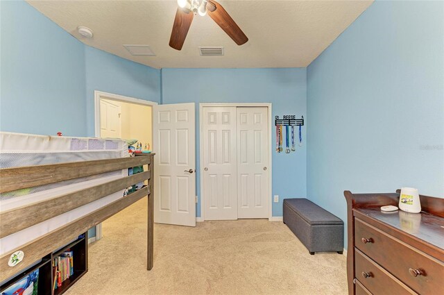 7822 110th Ave E, Parrish, FL 34219 - interior space with light colored carpet, visible vents, a ceiling fan, and a closet