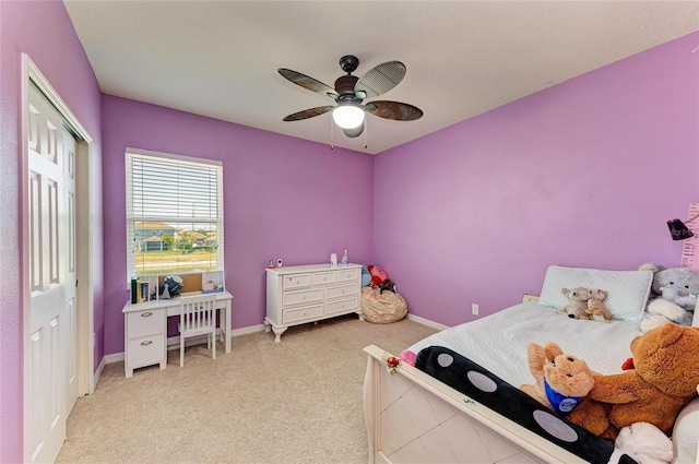 7822 110th Ave E, Parrish, FL 34219 - bedroom featuring baseboards, ceiling fan, a closet, and light colored carpet