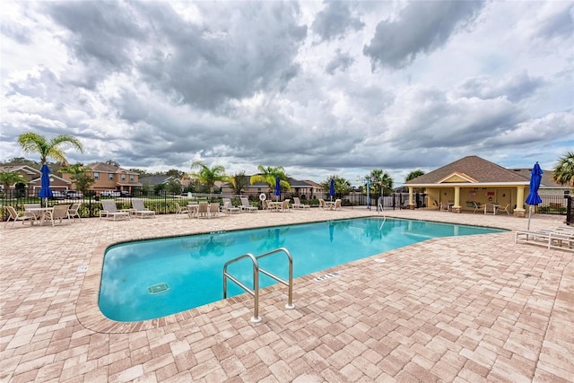 7822 110th Ave E, Parrish, FL 34219 - community pool with a patio and fence