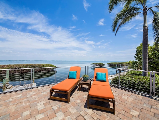 2282 Harbour Court Dr, Longboat Key, FL 34228 - view of patio / terrace featuring a water view and a balcony