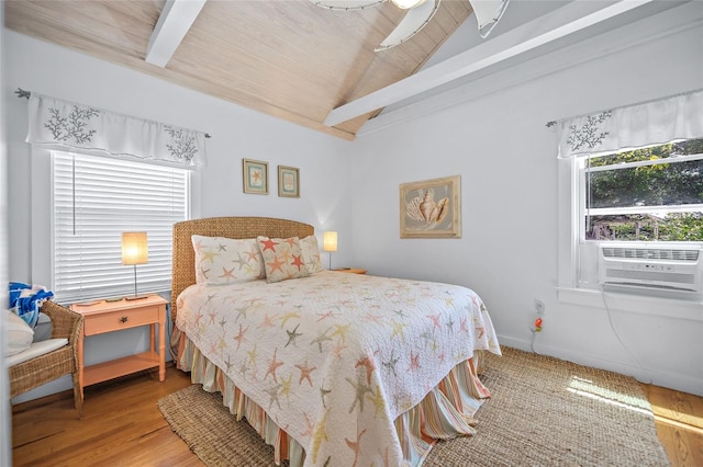bedroom with vaulted ceiling with beams, wood ceiling, cooling unit, and wood finished floors