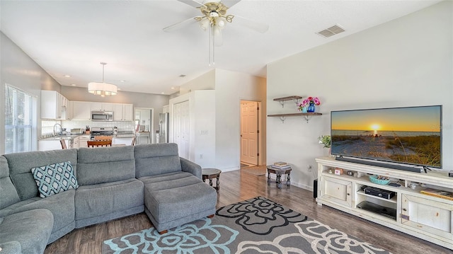 12339 Hollybush Ter, Lakewood Ranch, FL 34202 - living room featuring ceiling fan, wood finished floors, baseboards, and recessed lighting