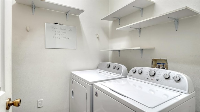 12339 Hollybush Ter, Lakewood Ranch, FL 34202 - laundry area featuring washing machine and dryer