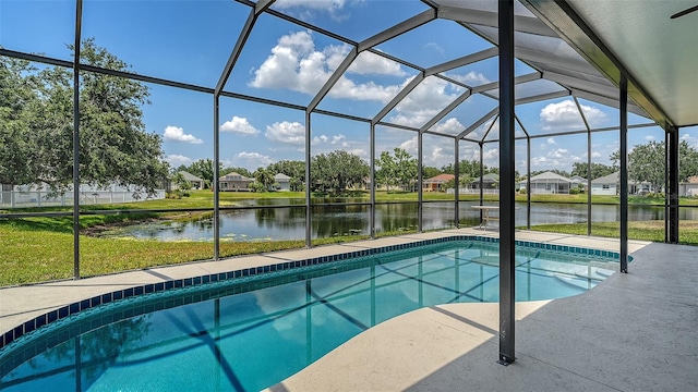 12339 Hollybush Ter, Lakewood Ranch, FL 34202 - swimming pool featuring a water view, a residential view, glass enclosure, a lawn, and a patio