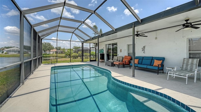 12339 Hollybush Ter, Lakewood Ranch, FL 34202 - swimming pool featuring ceiling fan, a patio area, outdoor lounge area, and glass enclosure