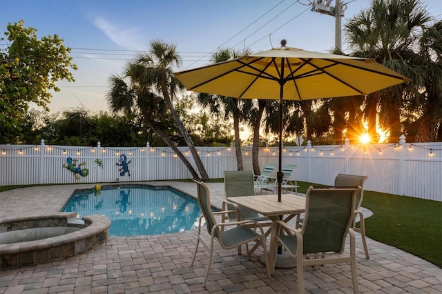 view of pool featuring a patio and a fenced backyard