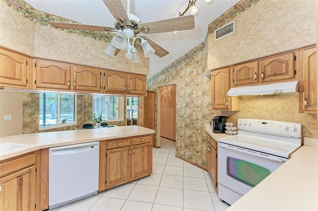 kitchen featuring ceiling fan, white appliances, wallpapered walls, under cabinet range hood, and visible vents