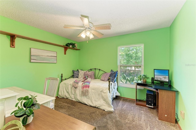 bedroom with carpet floors, a textured ceiling, and ceiling fan
