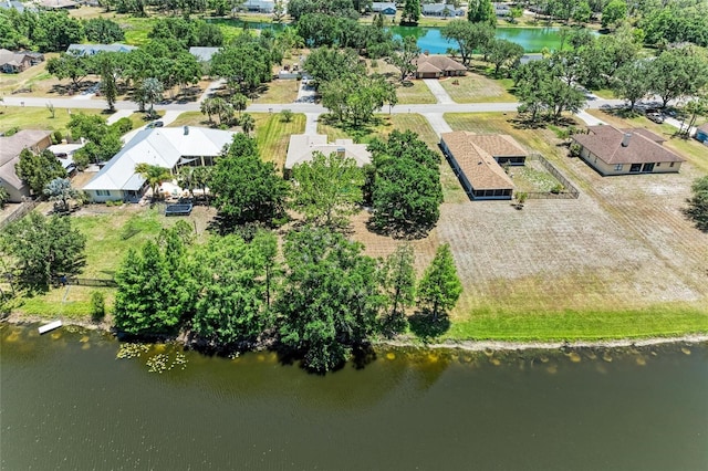 bird's eye view with a water view and a residential view