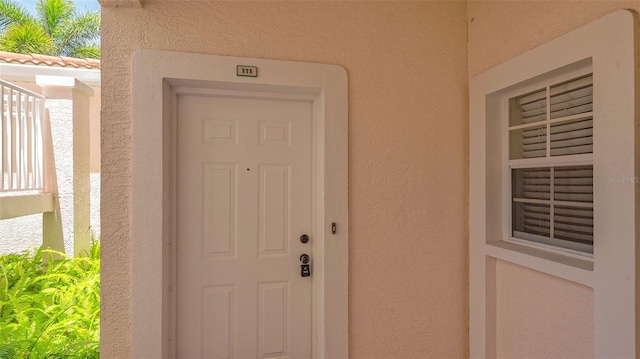4264 Central Sarasota Pkwy Unit 111, Sarasota, FL 34238 - entrance to property with stucco siding
