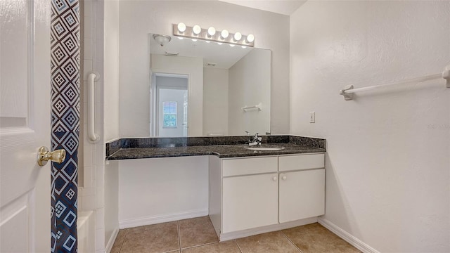 4264 Central Sarasota Pkwy Unit 111, Sarasota, FL 34238 - full bathroom with tile patterned flooring, vanity, and baseboards