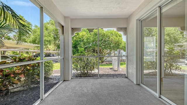 4264 Central Sarasota Pkwy Unit 111, Sarasota, FL 34238 - unfurnished sunroom with healthy amount of natural light