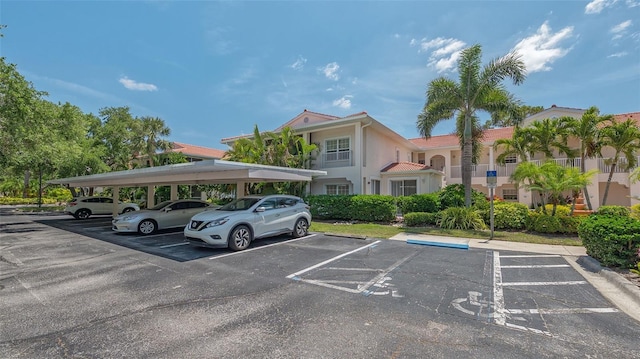 4264 Central Sarasota Pkwy Unit 111, Sarasota, FL 34238 - view of partially covered parking lot