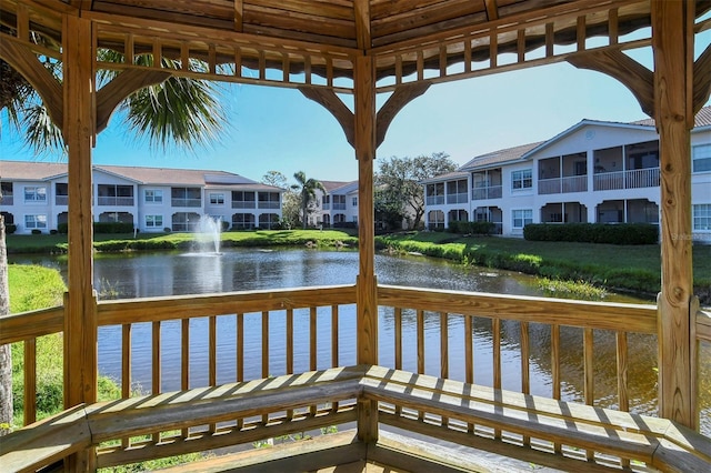 4264 Central Sarasota Pkwy Unit 111, Sarasota, FL 34238 - deck featuring a water view and a residential view