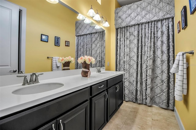 full bathroom featuring double vanity