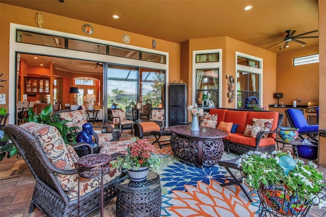 view of patio featuring outdoor lounge area and a ceiling fan