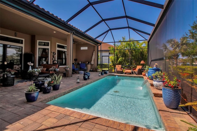outdoor pool featuring a patio, ceiling fan, an outdoor living space, and glass enclosure