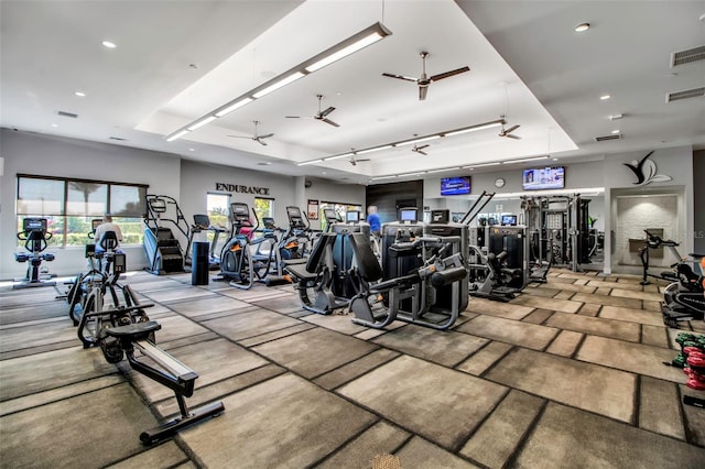 workout area featuring ceiling fan and recessed lighting