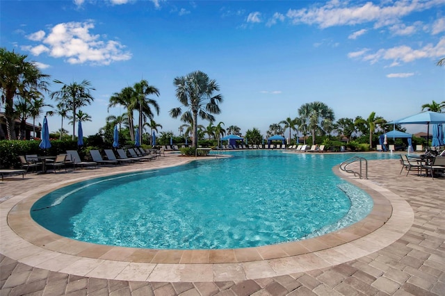 community pool featuring a patio
