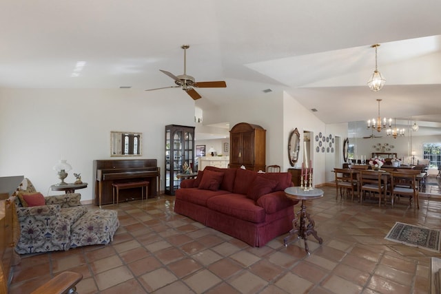 3209 2nd Ave W, Bradenton, FL 34205 - tiled living area with high vaulted ceiling and ceiling fan with notable chandelier