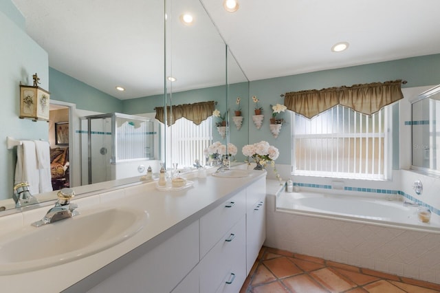 3209 2nd Ave W, Bradenton, FL 34205 - bathroom featuring recessed lighting, a sink, a shower stall, double vanity, and a garden tub
