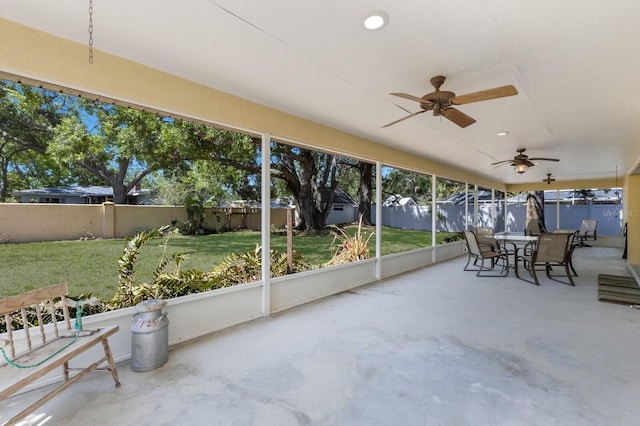 3209 2nd Ave W, Bradenton, FL 34205 - sunroom with outdoor dining space and ceiling fan